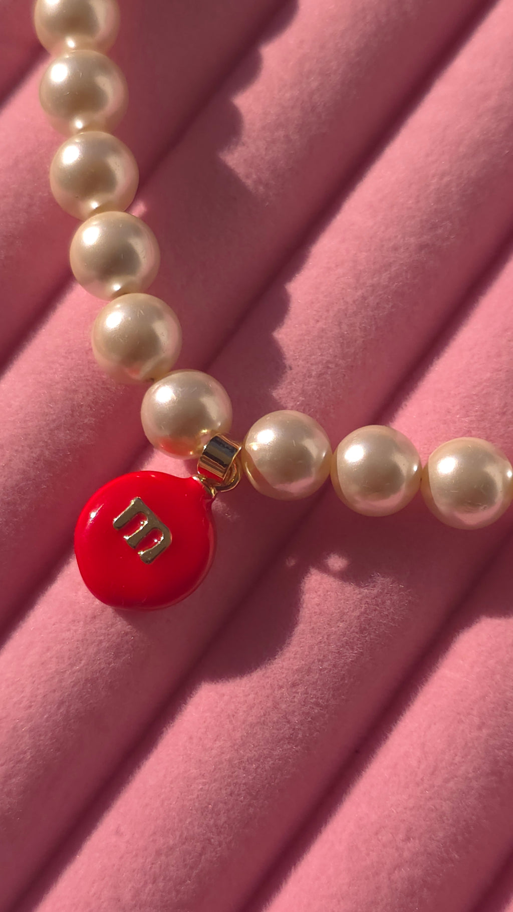 Imitation Pearl Choker with m&m's pendant